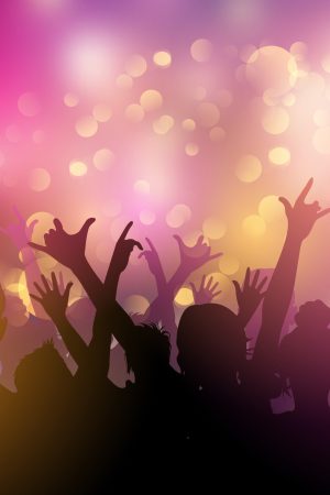 Party background with silhouettes of people in an audience
